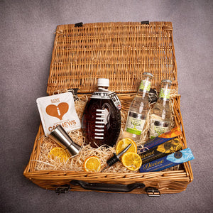 A personalised NFL vodka gift hamper containing NFL-themed vodka bottle, mixers, and snacks