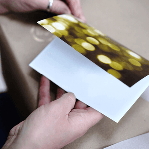 An empty gift card with an image of yellow bubbles displayed on it