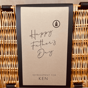 A Fathers Day wicker hamper personalised with a Fathers Day message on the sleeve