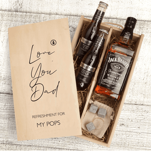 A Father's Day themed personalized Jack Daniels whiskey gift set with a custom message on the box, containing two bottlesof Fever Tree Cola, a bottle of Jack Daniels whiskey and whiskey stones for cooling.