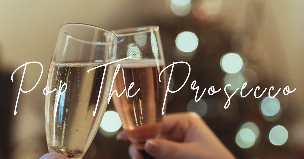 Prosecco glasses clinking in celebration