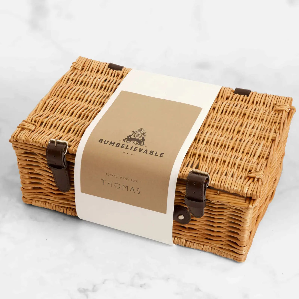 Hamper with personalised sleeve saying rumbelievable