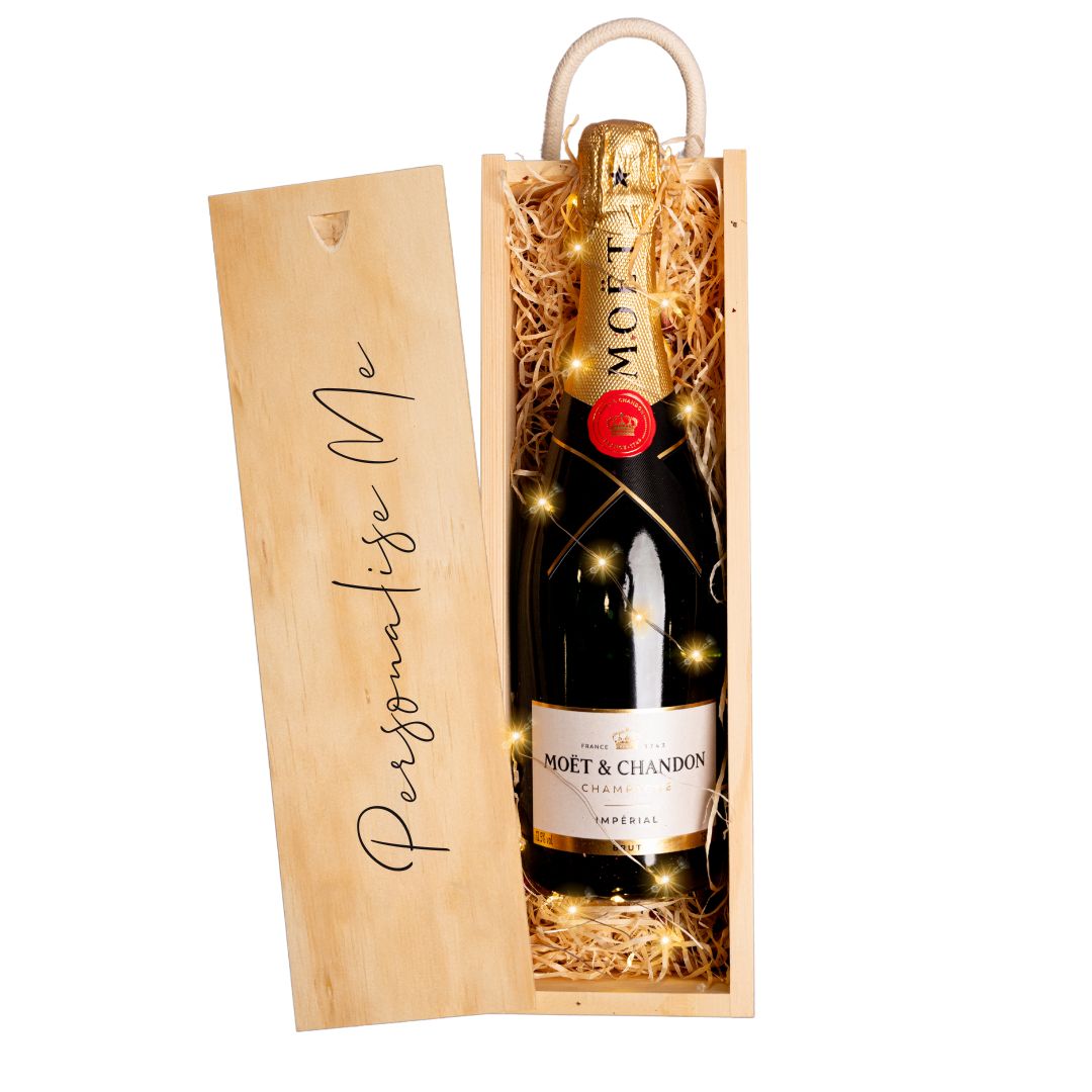 Moet Chandon presented in a Wooden Gift with fairy lights inside and the words &#39;Personliase Me&#39; on the lid.